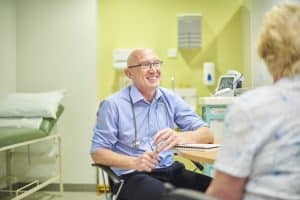Patient talking to doctor