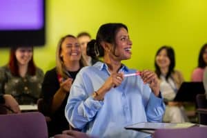Women laughing happily together