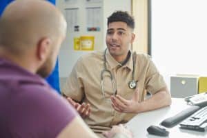 A doctor talks to a patient